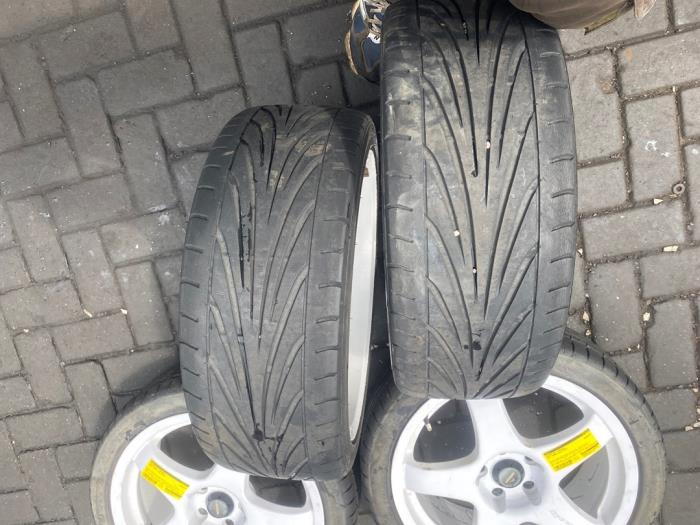 Velgen set + banden van een Opel Corsa D 1.6i OPC 16V Turbo 2012