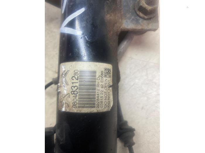 Schokdemper links-voor van een Peugeot 208 I (CA/CC/CK/CL) 1.2 Vti 12V PureTech 82 2015