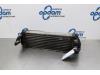 Intercooler van een Ford Transit Connect, 2002 / 2013 1.8 TDCi 75, Bestel, Diesel, 1.753cc, 55kW (75pk), FWD, R2PA; EURO4, 2006-10 / 2013-12 2007