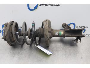 Gebruikte Schokdemperpoot links-voor Mazda 323 Fastbreak (BJ14) 1.3 LX,GLX 16V Prijs € 30,00 Margeregeling aangeboden door Gebr Opdam B.V.