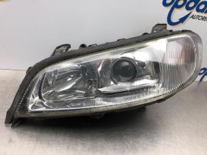 Gebruikte Linker Koplamp Opel Omega B Caravan (21/22/23) 2.5 V6 24V Prijs € 85,00 Margeregeling aangeboden door Gebr Opdam B.V.