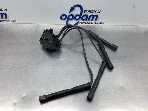 Gebruikte Bobine Renault Clio II (BB/CB) 1.2 16V Prijs € 34,00 Margeregeling aangeboden door Gebr Opdam B.V.