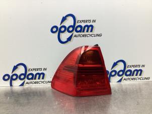 Gebruikte Achterlicht links BMW 3 serie Touring (E91) 318i 16V Prijs € 34,00 Margeregeling aangeboden door Gebr Opdam B.V.