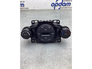 Gebruikte Kachel Bedieningspaneel Ford Fiesta 6 (JA8) 1.25 16V Prijs € 42,00 Margeregeling aangeboden door Gebr Opdam B.V.