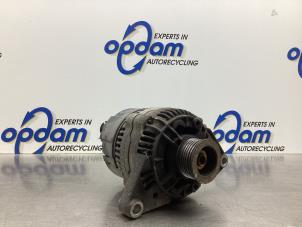 Gebruikte Dynamo Nissan Micra (K11) 1.0 L,LX 16V Prijs € 42,00 Margeregeling aangeboden door Gebr Opdam B.V.