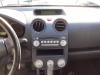 Radio CD Speler van een Mitsubishi Colt (Z2/Z3), 2004 / 2012 1.5 16V CZ3, Hatchback, Benzine, 1.499cc, 80kW (109pk), FWD, 4A91, 2004-10 / 2008-08, Z26A 2008
