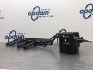 Gebruikte Bobine Volkswagen Polo III (6N2) 1.4 16V 75 Prijs € 22,00 Margeregeling aangeboden door Gebr Opdam B.V.