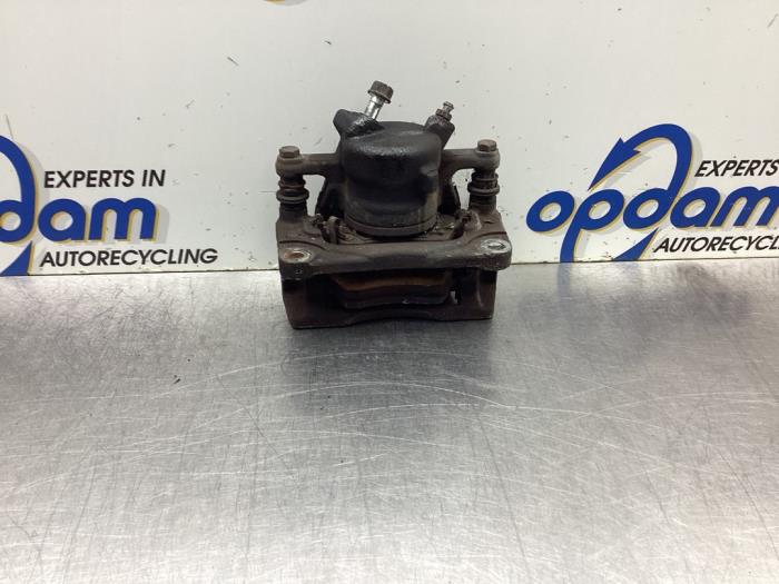 Remklauw (Tang) rechts-voor van een Suzuki Splash 1.0 12V 2008