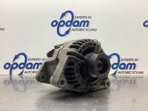 Gebruikte Alternator Opel Corsa D 1.4 16V Twinport Prijs € 22,00 Margeregeling aangeboden door Gebr Opdam B.V.