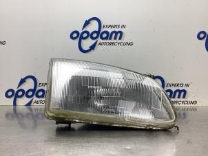 Gebruikte Koplamp rechts Toyota Starlet (EP9) 1.3,XLi,GLi 16V Prijs € 40,00 Margeregeling aangeboden door Gebr Opdam B.V.