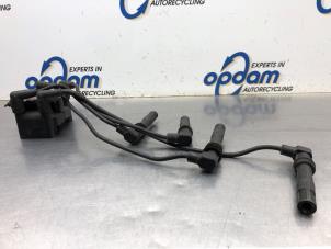 Gebruikte Bobine Volkswagen Polo III (6N2) 1.4 16V 75 Prijs € 36,00 Margeregeling aangeboden door Gebr Opdam B.V.