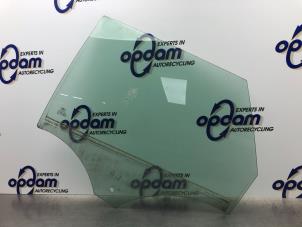 Gebruikte Deurruit 4Deurs links-achter Ford Mondeo IV Wagon 2.0 16V Prijs € 36,00 Margeregeling aangeboden door Gebr Opdam B.V.