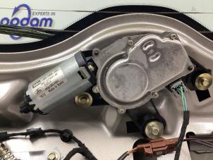 Gebruikte Ruitenwissermotor achter Ford Fiesta 5 (JD/JH) 1.4 16V Prijs € 45,00 Margeregeling aangeboden door Gebr Opdam B.V.