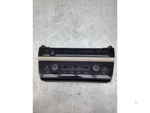 Gebruikte Kachel Bedieningspaneel BMW 5 serie (F10) 520i 16V Prijs € 125,00 Margeregeling aangeboden door Gebr Opdam B.V.