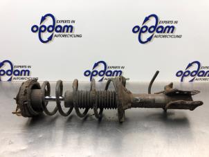 Gebruikte Veerpoot links-achter Mazda 323 Fastbreak (BJ14) 1.6 16V Prijs € 40,00 Margeregeling aangeboden door Gebr Opdam B.V.