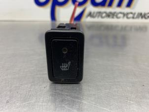 Gebruikte Schakelaar Stoelverwarming Suzuki Swift (ZA/ZC/ZD) 1.2 16V Prijs € 25,00 Margeregeling aangeboden door Gebr Opdam B.V.