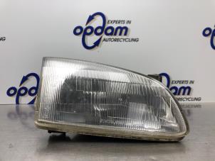 Gebruikte Koplamp rechts Toyota Starlet (EP9) 1.3,XLi,GLi 16V Prijs € 40,00 Margeregeling aangeboden door Gebr Opdam B.V.