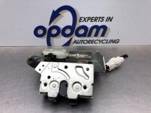 Gebruikte Achterklep Slotmechaniek Ford Mondeo III 1.8 16V Prijs € 60,00 Margeregeling aangeboden door Gebr Opdam B.V.