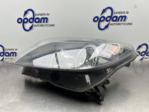 Gebruikte Linker Koplamp Opel Astra H GTC (L08) 1.6 16V Prijs € 75,00 Margeregeling aangeboden door Gebr Opdam B.V.