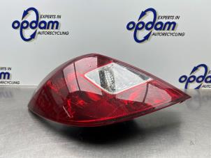 Gebruikte Achterlicht links Opel Corsa D 1.4 16V Twinport Prijs € 35,00 Margeregeling aangeboden door Gebr Opdam B.V.