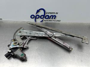 Gebruikte Raammechaniek 4Deurs rechts-voor Honda Civic (FK1/2/3) 1.4i VTEC 16V Prijs € 70,00 Margeregeling aangeboden door Gebr Opdam B.V.