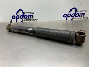 Gebruikte Schokbreker links-achter Renault Grand Scénic III (JZ) 1.6 16V Prijs € 25,00 Margeregeling aangeboden door Gebr Opdam B.V.