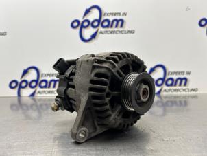 Gebruikte Alternator Nissan Micra (K12) 1.2 16V Prijs € 50,00 Margeregeling aangeboden door Gebr Opdam B.V.