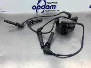 Gebruikte Bobine Volkswagen Polo III (6N2) 1.4 16V 75 Prijs € 20,00 Margeregeling aangeboden door Gebr Opdam B.V.