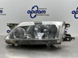 Gebruikte Koplamp links Mazda Premacy 1.8 16V Prijs € 50,00 Margeregeling aangeboden door Gebr Opdam B.V.