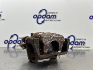 Gebruikte Remklauw (Tang) rechts-achter Opel Astra G Caravan (F35) Prijs € 30,00 Margeregeling aangeboden door Gebr Opdam B.V.