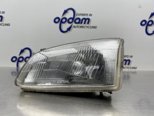 Gebruikte Koplamp links Toyota Starlet (EP9) 1.3,XLi,GLi 16V Prijs € 40,00 Margeregeling aangeboden door Gebr Opdam B.V.