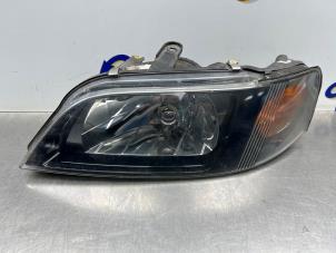 Gebruikte Koplamp links Mitsubishi Space Star (DG) 1.8 MPi 16V Prijs € 125,00 Margeregeling aangeboden door Gebr Opdam B.V.