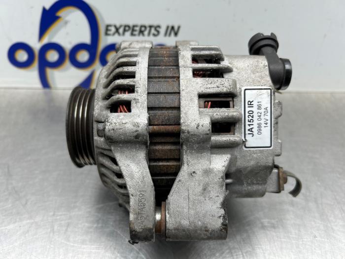 Dynamo van een Honda Logo (GA33) 1.3 1999