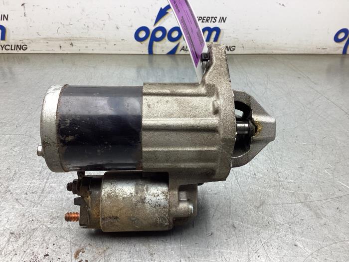 Startmotor van een Mitsubishi Space Star (A0) 1.2 12V 2018