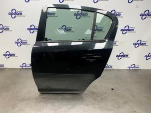 Gebruikte Portier 4Deurs links-achter Opel Corsa D 1.4 16V Twinport Prijs € 200,00 Margeregeling aangeboden door Gebr Opdam B.V.