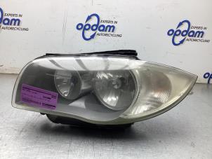 Gebruikte Linker Koplamp BMW 1 serie (E81) 116i 1.6 16V Prijs € 60,00 Margeregeling aangeboden door Gebr Opdam B.V.