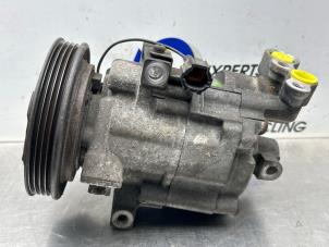 Gebruikte Aircopomp Nissan Micra (K12) 1.2 16V Prijs € 150,00 Margeregeling aangeboden door Gebr Opdam B.V.