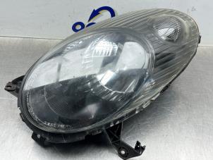 Gebruikte Koplamp links Nissan Micra (K12) 1.2 16V Prijs € 50,00 Margeregeling aangeboden door Gebr Opdam B.V.
