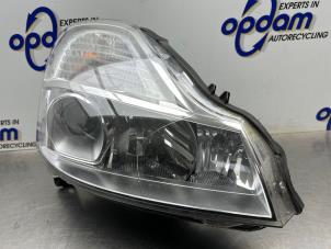 Gebruikte Koplamp rechts Renault Modus/Grand Modus (JP) 1.2 16V TCE 100 Prijs € 150,00 Margeregeling aangeboden door Gebr Opdam B.V.