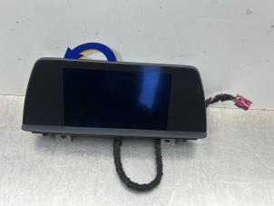 Gebruikte Display Multi Media regelunit BMW 3 serie (F30) 320i 2.0 16V Prijs € 225,00 Margeregeling aangeboden door Gebr Opdam B.V.