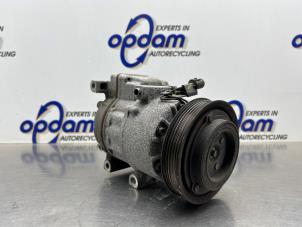 Pomp Airco van een Kia Cee'd Sporty Wagon (EDF) 1.4 16V 2011