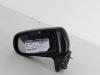 Buitenspiegel links van een Mazda Premacy 1.8 16V Exclusive HP 2000