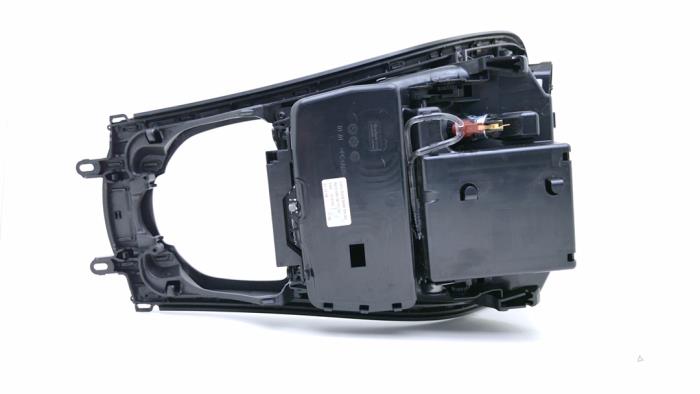 Middenconsoles van een Mercedes-Benz C (W205) C-180 1.6 16V 2015