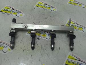 Gebruikte Injector brug Opel Corsa D 1.4 16V Twinport Prijs € 31,50 Margeregeling aangeboden door Binckhorst BV