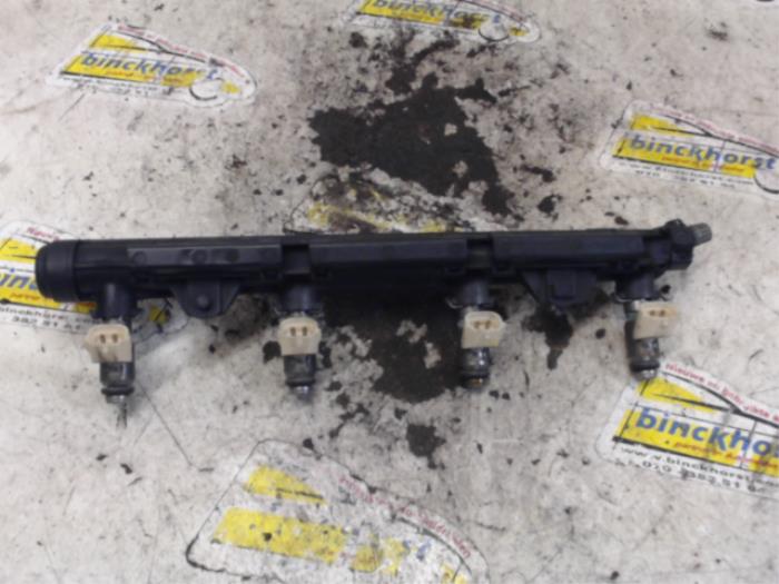 Gebruikte Injector brug Volkswagen Golf V (1K1) 1.4 16V Prijs € 63,00 Margeregeling aangeboden door Binckhorst BV