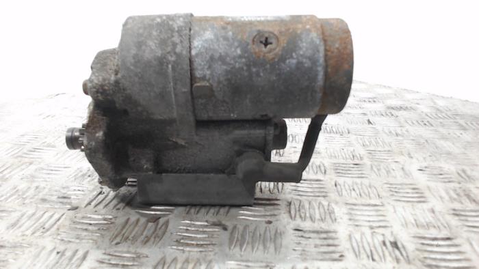 Startmotor van een Hyundai Santa Fe II (CM) 2.2 CRDi 16V 4x4 2006