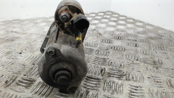 Startmotor van een Volkswagen Polo V (6R) 1.2 TDI 12V BlueMotion 2011