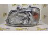 Koplamp links van een Daihatsu Charade 1997