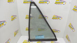 Gebruikte Driehoeks Ruit links-achter Mazda 323 Prijs € 26,25 Margeregeling aangeboden door Binckhorst BV