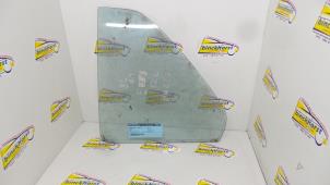 Gebruikte Driehoeks Ruit links-achter Mazda 323 Prijs € 26,25 Margeregeling aangeboden door Binckhorst BV